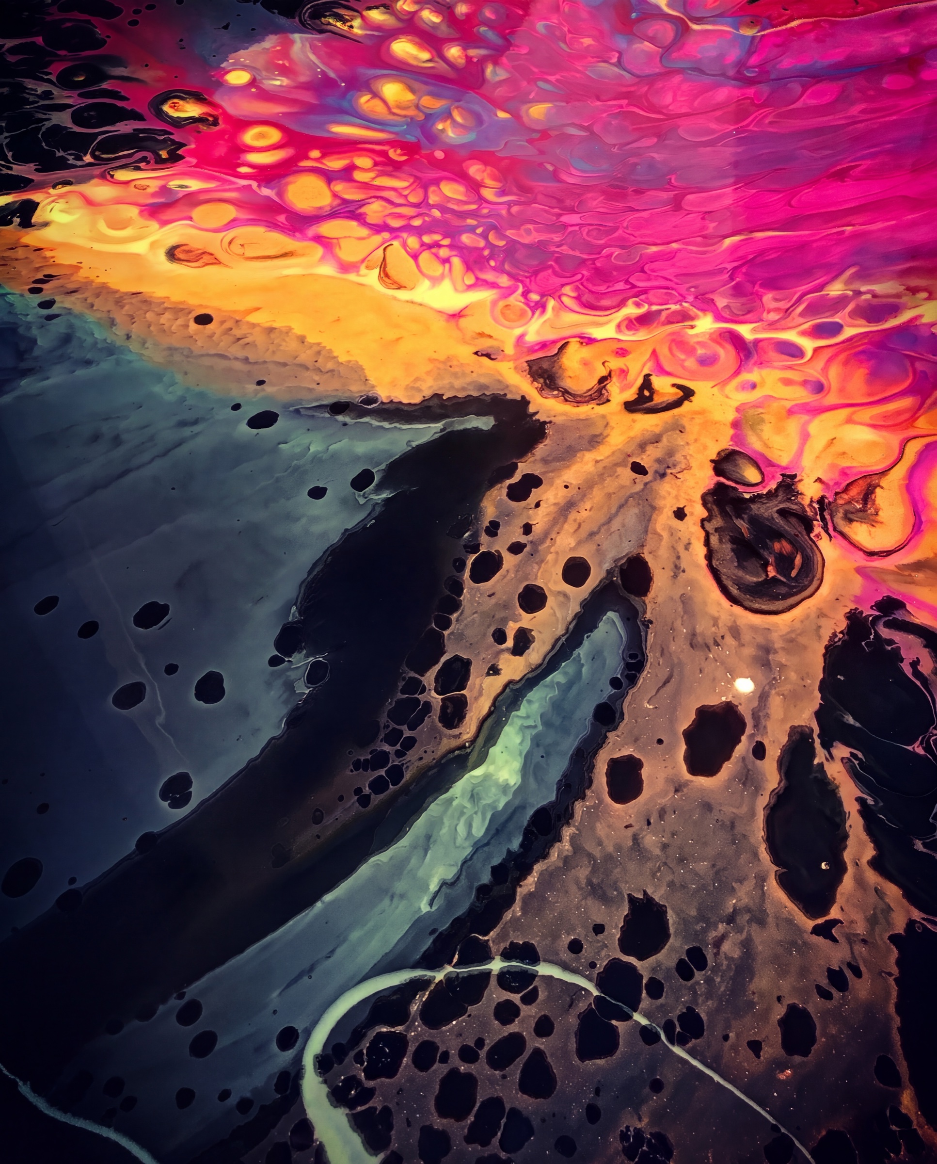 Resin pour with magenta, gold and deep blue cells